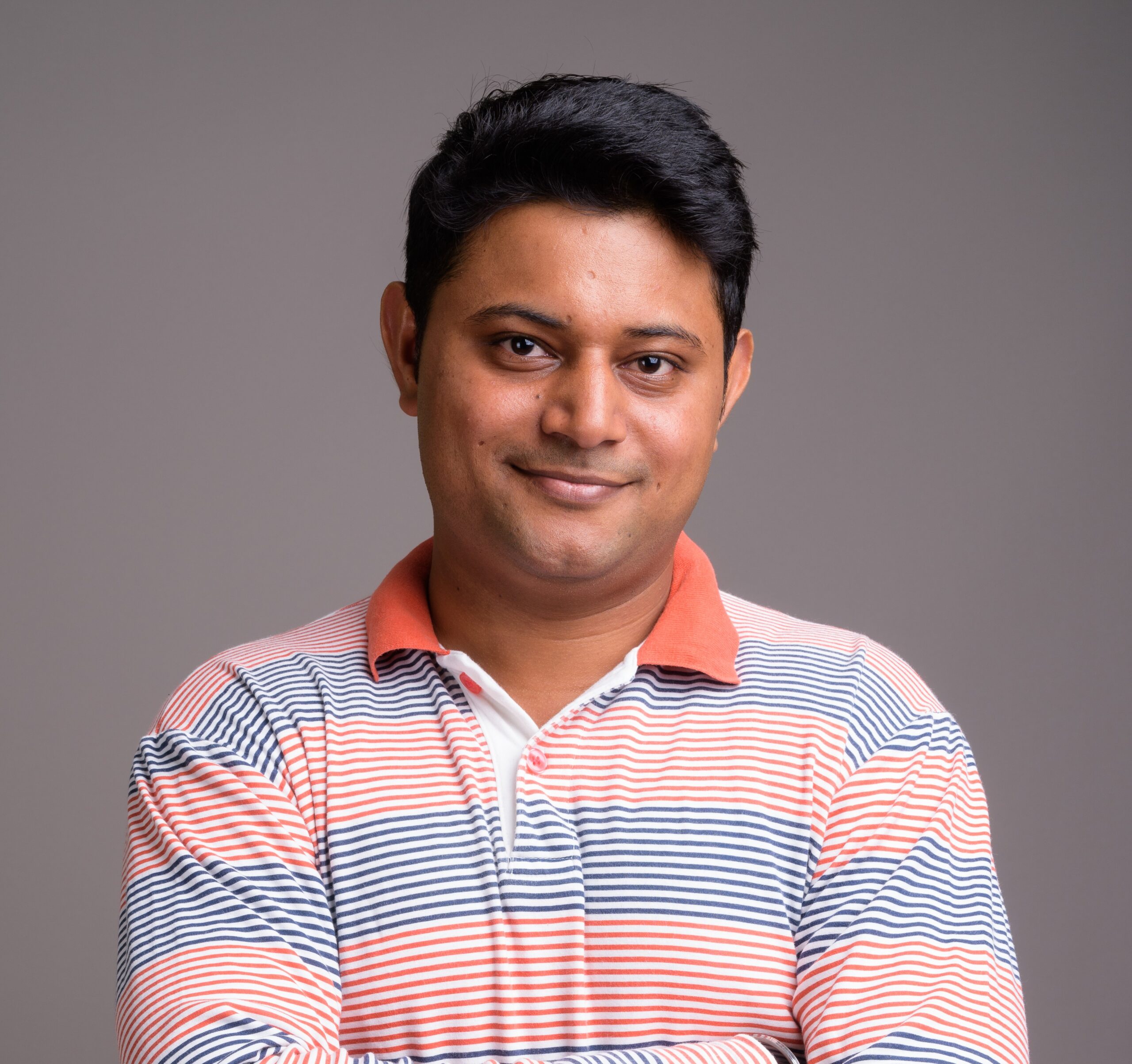 Esthetica Maxillofacial Hospital 40 young indian man wearing long sleeve striped polo shirt 1 scaled October 2025 Vadodara India